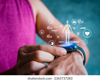 Mid adult man using smart watch during training. Heart monitor beats with wristwatch. smart watch or future data on healthcare. technology in use of smart watch for health condition.