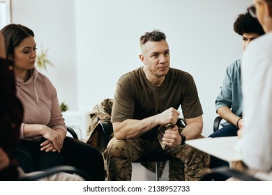 Mid Adult Veteran Attending Group Therapy Session At Mental Health Center.