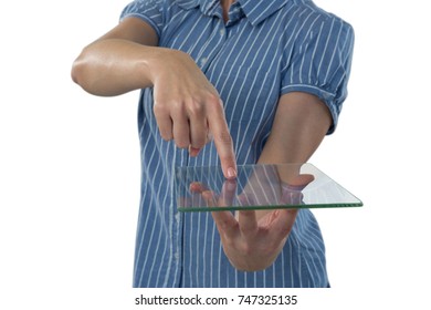 Mid section of female executive using glass digital tablet