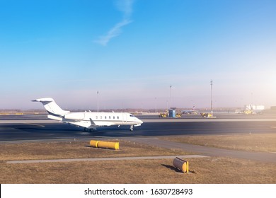 Mid Size Modern Vip Private Jet Running On Rairport Runway Ready To Departure. Pilot Asking Air Traffic Control Officer For Take-off Clearance. Luxury Small Corporate Business Aircraft Trip