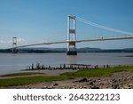Mid view of the Old M48 Severn crossing with remains of the ferry pier in foreground