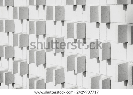 Mid-century modern exterior block wall pattern and texture with shadows