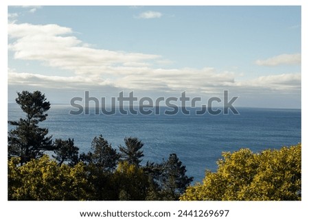 a mid-day coastal shot, with the emphasis on the movement of water stirred by a strong breeze under the bright sunlight. [[stock_photo]] © 