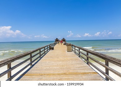 Midday At Naples Pier On Beach Golf Of Mexico, Florida