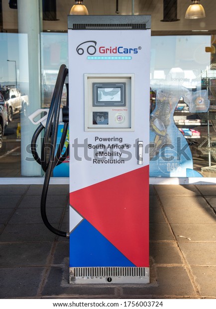 Middelburg,\
Mpumalanga / South Africa - June 10 2020:  Grid Cars electric\
vehicle power charging point at Alzu Total gas station, next to the\
N4 high way, Mpumalanga, South\
Africa.