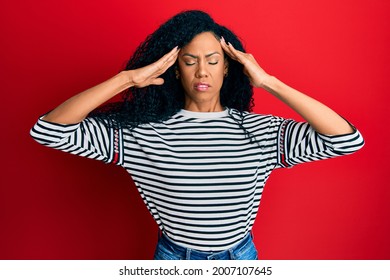 Middle Age African American Woman Wearing Casual Clothes With Hand On Head, Headache Because Stress. Suffering Migraine. 