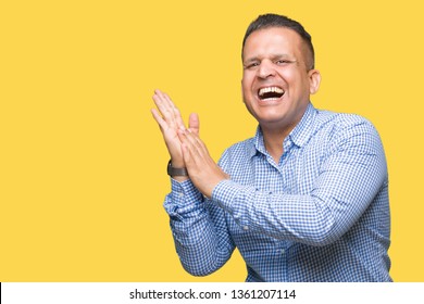 Middle Age Arab Business Man Over Isolated Background Clapping And Applauding Happy And Joyful, Smiling Proud Hands Together