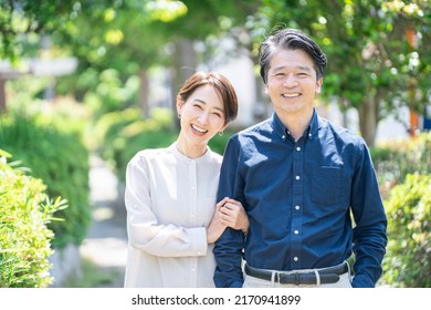 Middle age Asian couple dating - Powered by Shutterstock