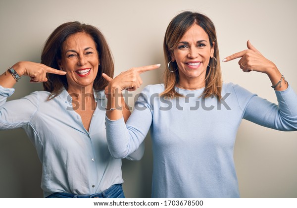 Middle Age Beautiful Couple Sisters Standing Stock Photo (Edit Now