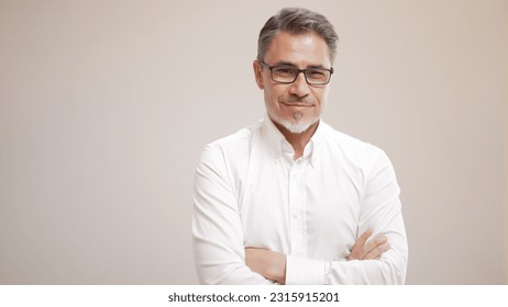 Middle age businessman in white business shirt. Casual entrepreneur. Portrait of mid adult, mature age man, happy smiling. Isolated on white, copy space. - Powered by Shutterstock