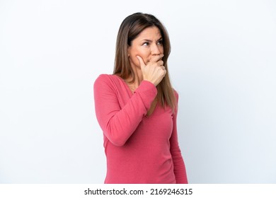 Middle age caucasian woman isolated on white background having doubts and with confuse face expression - Shutterstock ID 2169246315
