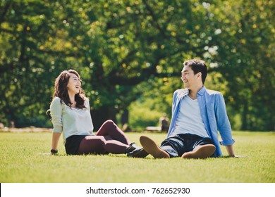 Middle Age Couple Spending Time Together In Tokyo On A Sunny Autumn Day