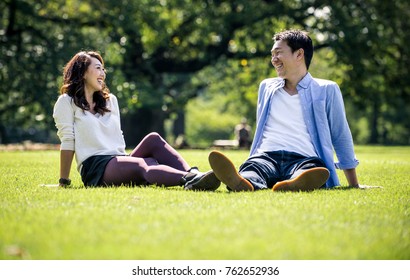 Middle Age Couple Spending Time Together In Tokyo On A Sunny Autumn Day