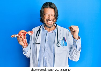 Middle Age Handsome Gynecologist Man Holding Stock Photo (Edit Now ...