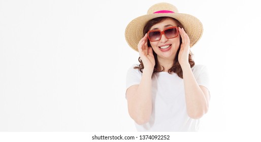 Middle Age Happy Woman In Summer Hat, Sunglasses. Summertime Skin Protection, Fashion Accessories. Female In Blank Template White T Shirt Isolated. Copy Space Background. Holiday And Beach Vacation.