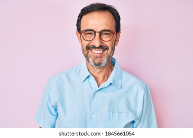 Middle Age Hispanic Man Wearing Casual Clothes And Glasses With A Happy And Cool Smile On Face. Lucky Person. 