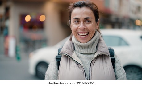 Middle Age Hispanic Woman Smiling Confident Standing At Street