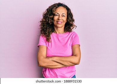 Middle Age Hispanic Woman Wearing Casual Clothes Happy Face Smiling With Crossed Arms Looking At The Camera. Positive Person. 