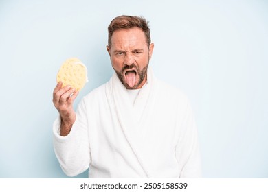 middle age man feeling disgusted and irritated and tongue out. shower concept - Powered by Shutterstock