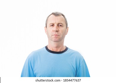 Middle Age Man Feeling Grumpy Over White Background. Portrait Of Irriated Middle Age Man Looking Very Displeased Isolated On White Background. Negative Human Emotions .