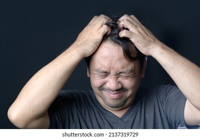 Middle Age Man Has Itching In His Hair On Black Background, Hair Care Concept