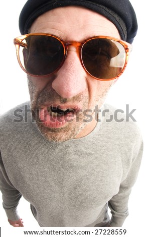 middle age senior man  grumpy funny face twisted mouth wearing artist french hippie beret hat macro close up distorted large nose face