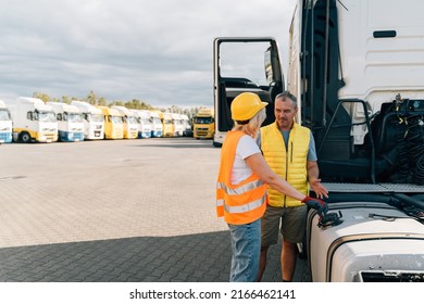 Middle Age Truck Driver Woman And Man Opens Gas Tank With Keys, Colleges Or Mechanic Worker 