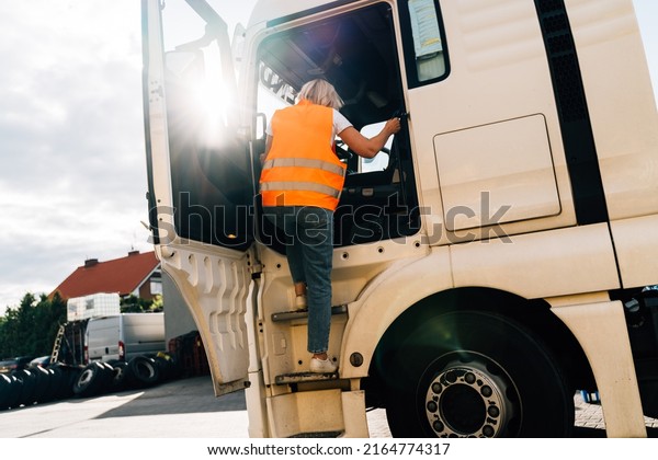 Middle age truck driver woman, trucker occupation
in Europe for females