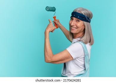 Middle Age White Hair Woman Painting A Wall