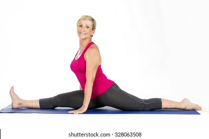 middle age woman doing split exercises