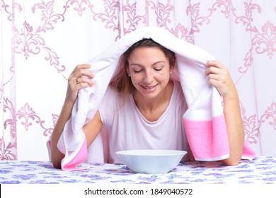 Middle Age Woman Inhales Steam For Blocked Nose