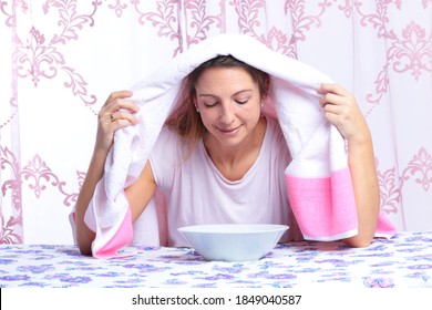 Middle Age Woman Inhales Steam For Blocked Nose