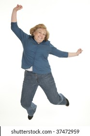 Middle Age Woman Jumping For Joy