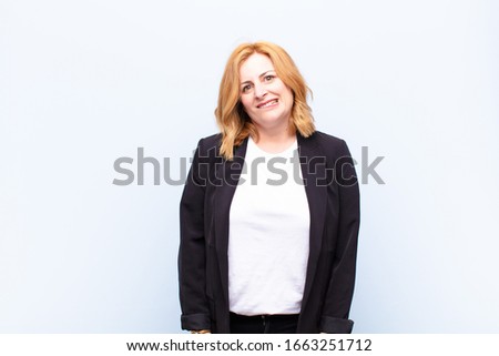 middle age woman looking puzzled and confused, biting lip with a nervous gesture, not knowing the answer to the problem