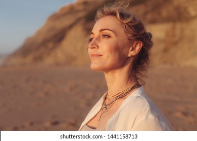 Middle age woman on a beach