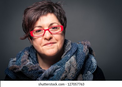 Middle Age Woman With Red Glasses Close Up Portrait On Dark Background.
