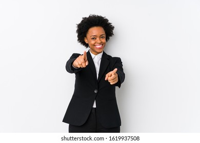 Middle Aged African American Business  Woman Against A White Background Isolated Cheerful Smiles Pointing To Front.