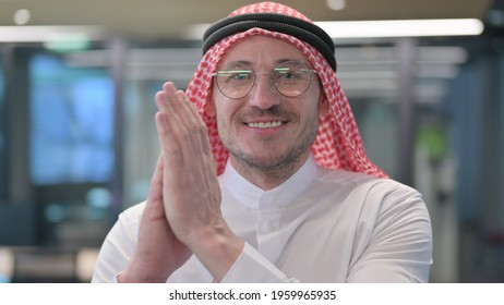 Middle Aged Arab Man Clapping, Applauding