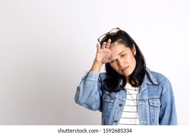 The Middle Aged Asian Woman On The White Background.