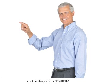 Middle Aged Businessman In Blue Shirt No Tie Smiling And Pointing Isolated On White