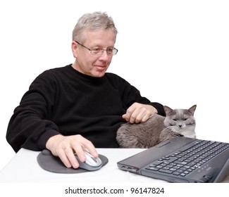 A Middle Aged Caucasian Man Happy Smiling And Looking At His Laptop Computer. Man Is Wearing Casual Black Sweater With His Cat Nearby And His Hand On Computer Mouse. Isolated On White Background.