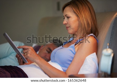 Similar – Female doctor showing results of a medical test on the tablet