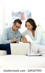 Middle Aged Couple Doing Home Finances