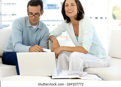 Middle Aged Couple Doing Home Finances