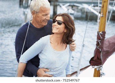 Middle Aged Couple On An Old Boat