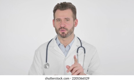 Middle Aged Doctor Talking On Video Call, White Background