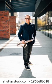 Middle Aged English Street Musican Playing On Saxophone