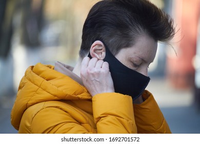 Middle Aged European Woman In Protective Black Mask, Woman Wearing Mask During Coronavirus COVID-19 Epidemic. Sick Woman Wearing Protection During Pandemic.