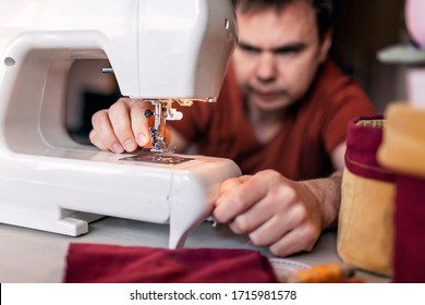 Middle Aged Father Working On Sewing Machine And Upcycling Old Color Jeans To Stylish Crafted Fabric Basket, Creative Tailor Workshop, Zero Waste Home Decor, Indoor Lifestyle