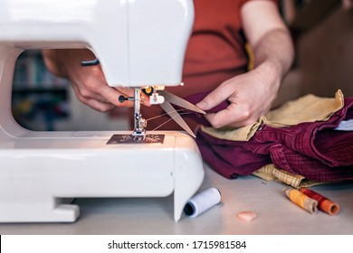 Middle Aged Father Working On Sewing Machine And Upcycling Old Color Jeans To Stylish Crafted Fabric Basket, Creative Tailor Workshop, Zero Waste Home Decor, Indoor Lifestyle